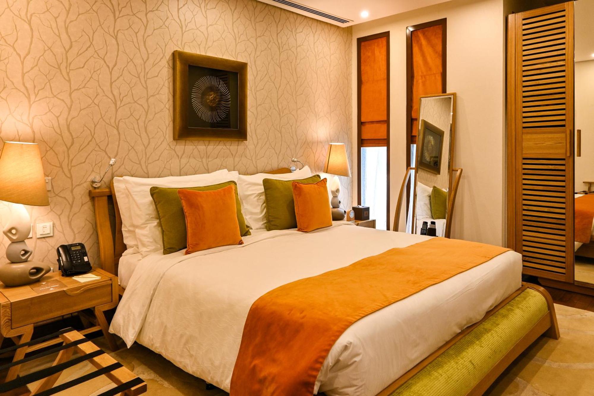 Palavra Resort Manama Eksteriør billede A bedroom at the Taj Bengal