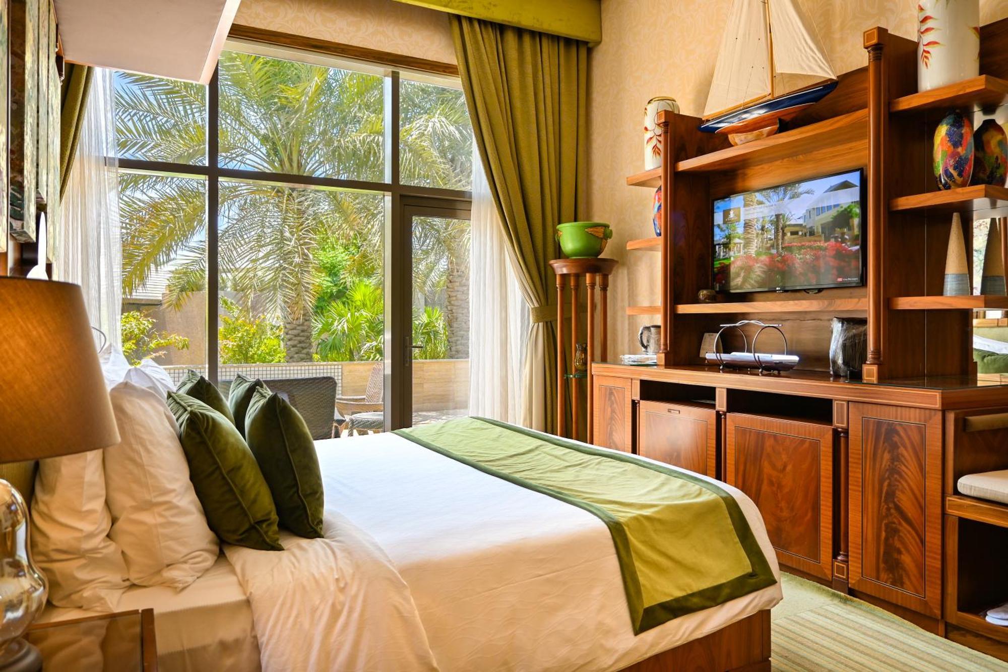 Palavra Resort Manama Eksteriør billede A bedroom at the resort