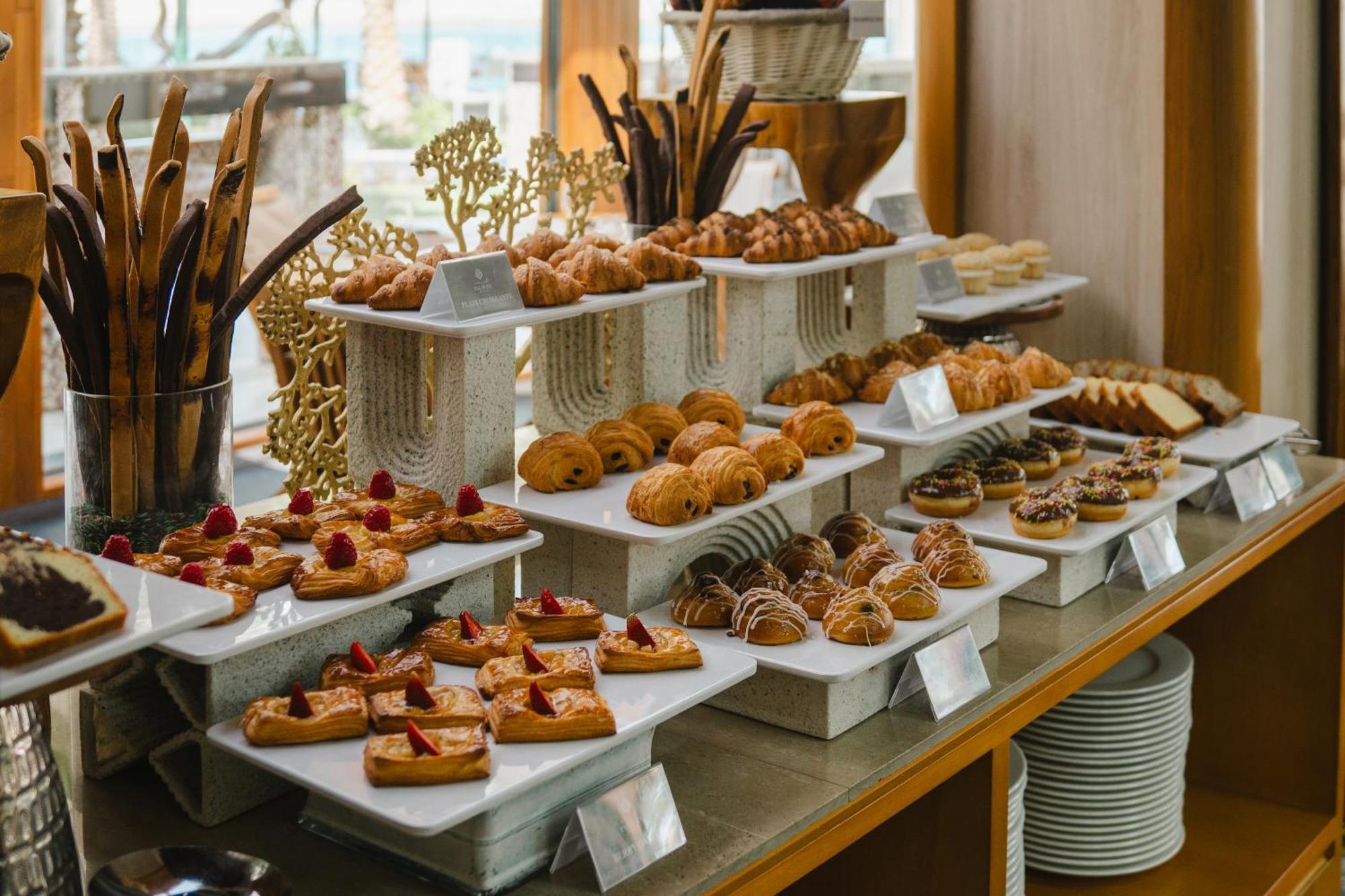 Palavra Resort Manama Eksteriør billede A selection of pastries