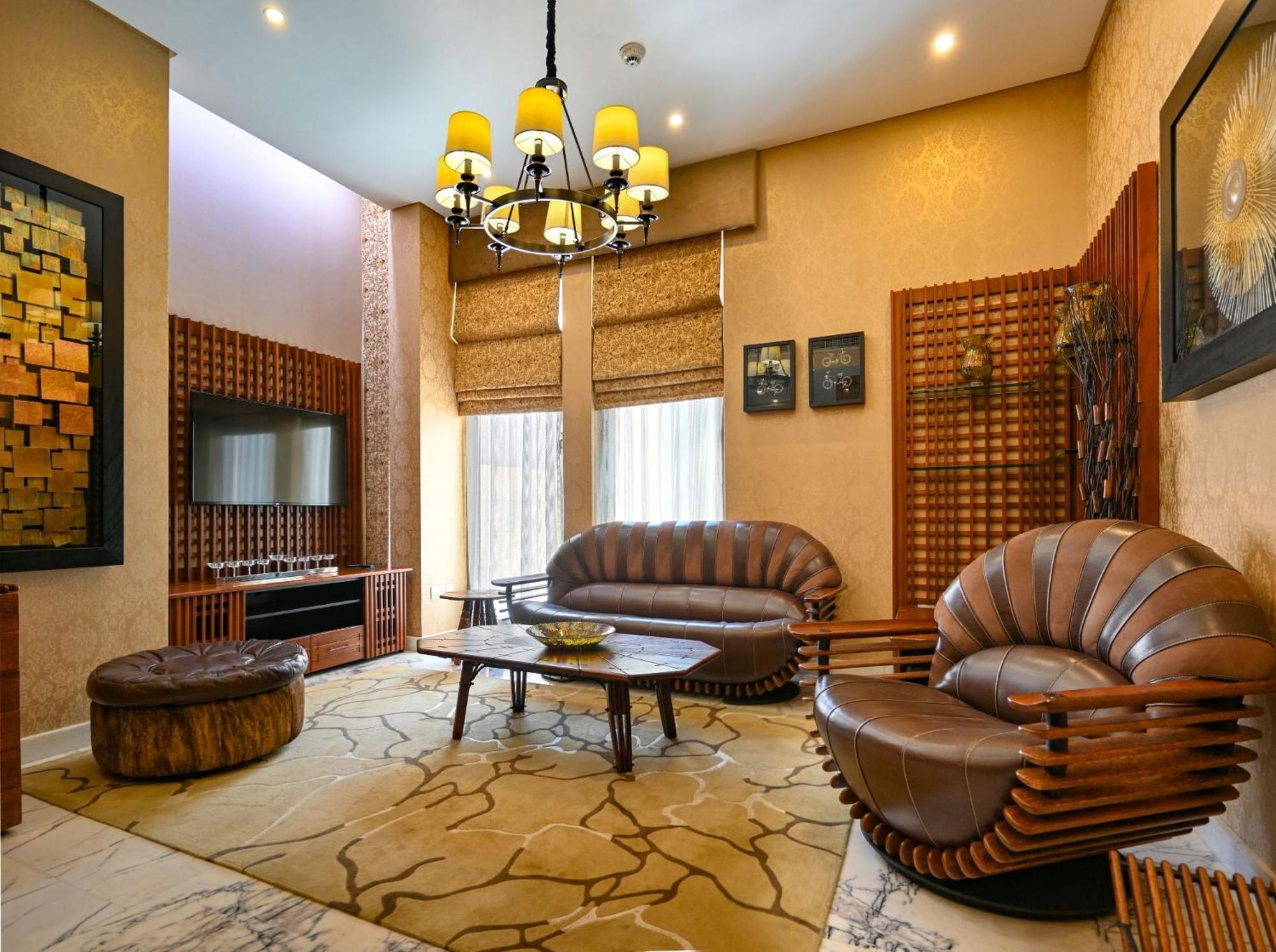 Palavra Resort Manama Eksteriør billede A living room in a house